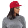 Woman in a red cap with "LOVE" text.