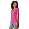 Woman smiling in a pink t-shirt.