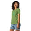 Woman smiling in a green t-shirt.