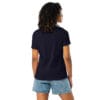 Woman wearing navy t-shirt and shorts.