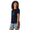 Woman wearing a shirt with text design.