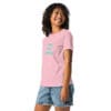 Woman smiling in pink shirt with text.