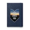 Notebook with "God Loves You" message.